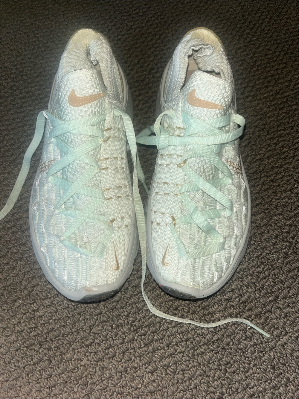 Nike woman’s  Mint Green Sneakers with Rose Gold Swoosh